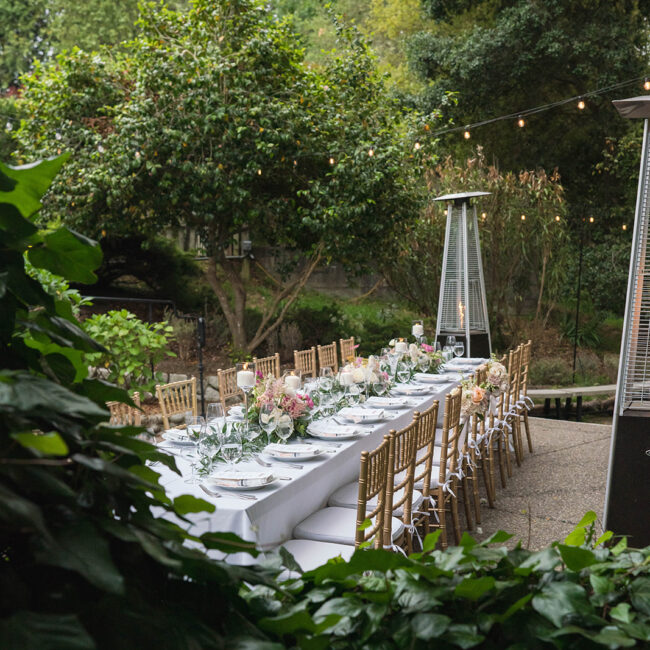 Olema House Creekside dining under trees